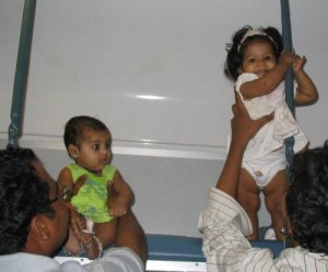 Babies enjoy the Indian Railways … especially the upper berth!