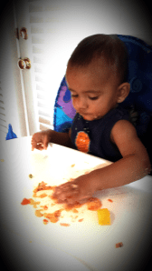 Aanya is focused on eating upma.