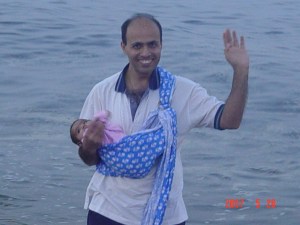 Vijay carries daughter in sling