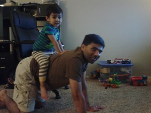 Shishir gets a ride on the elephant's back.