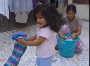 One-year-olds can help with laundry!