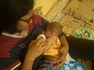 Tamia learning to breastfeed.