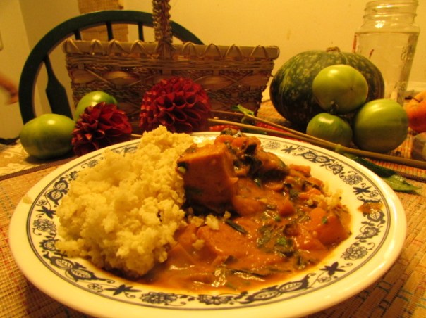Stew made of collard green and sweet potato served with millet.