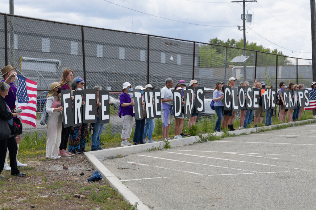 The Visibility Brigade demonstrates peacefully outside Delaney Hall in a protest to free fathers detained at the ICE detention facility in Newark on Father's Day.  Image courtesy of NJ.com
Free the Dads
Close the Camps
